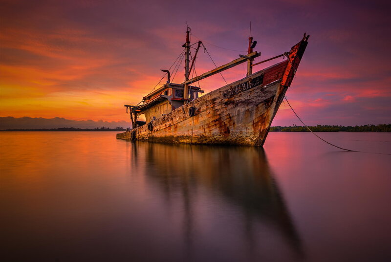 Abandoned Fishing Boat — Orange, Dramatic, Sunset