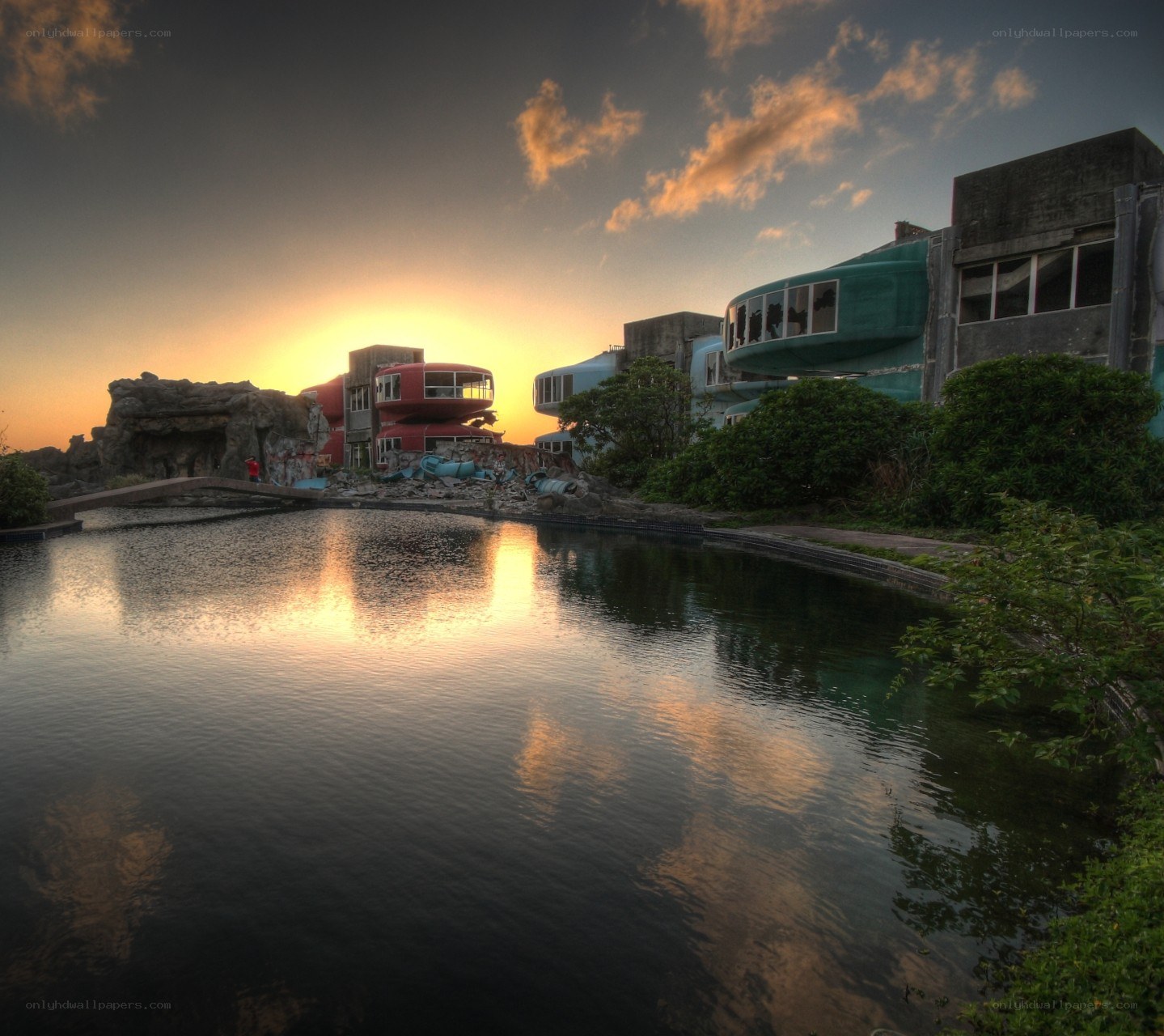 abandoned futuristic buildings at sunset