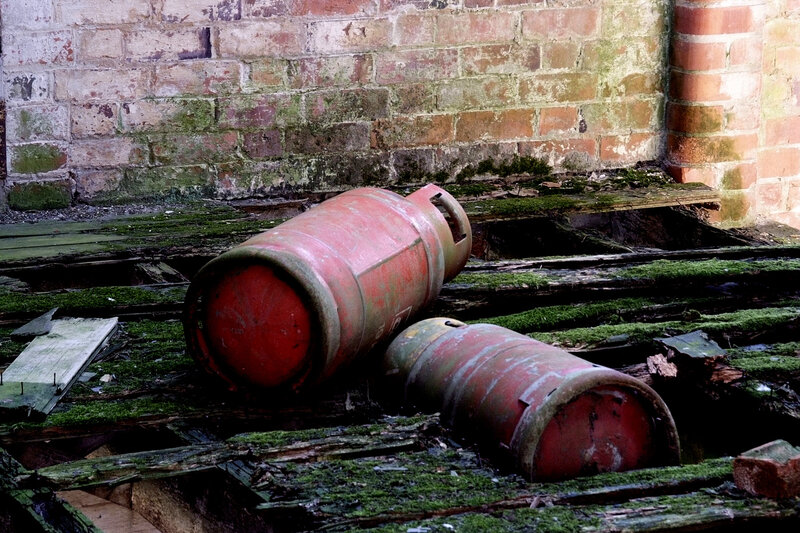 Abandoned gas cylinders in ruin