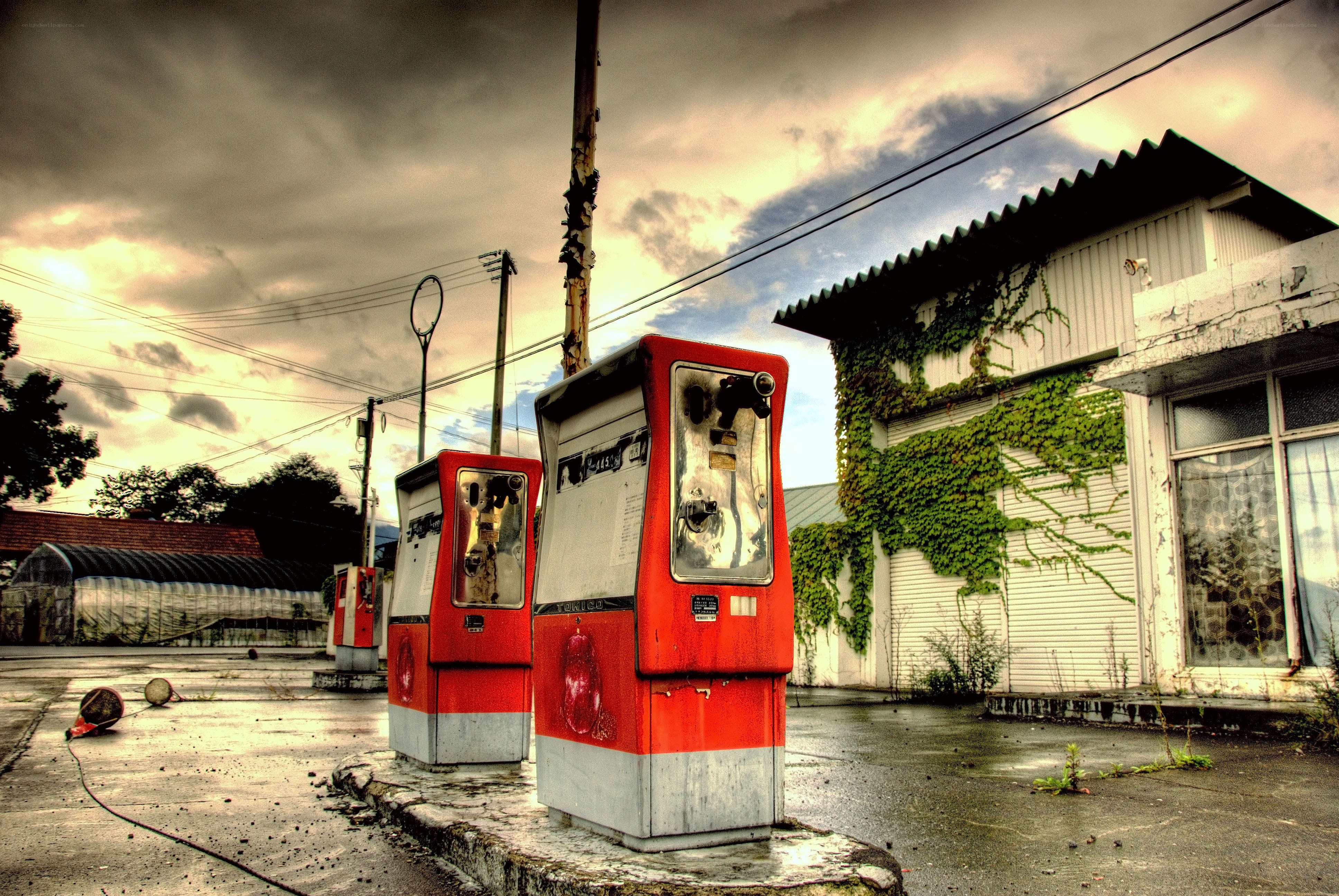 abandoned gas station at dusk
