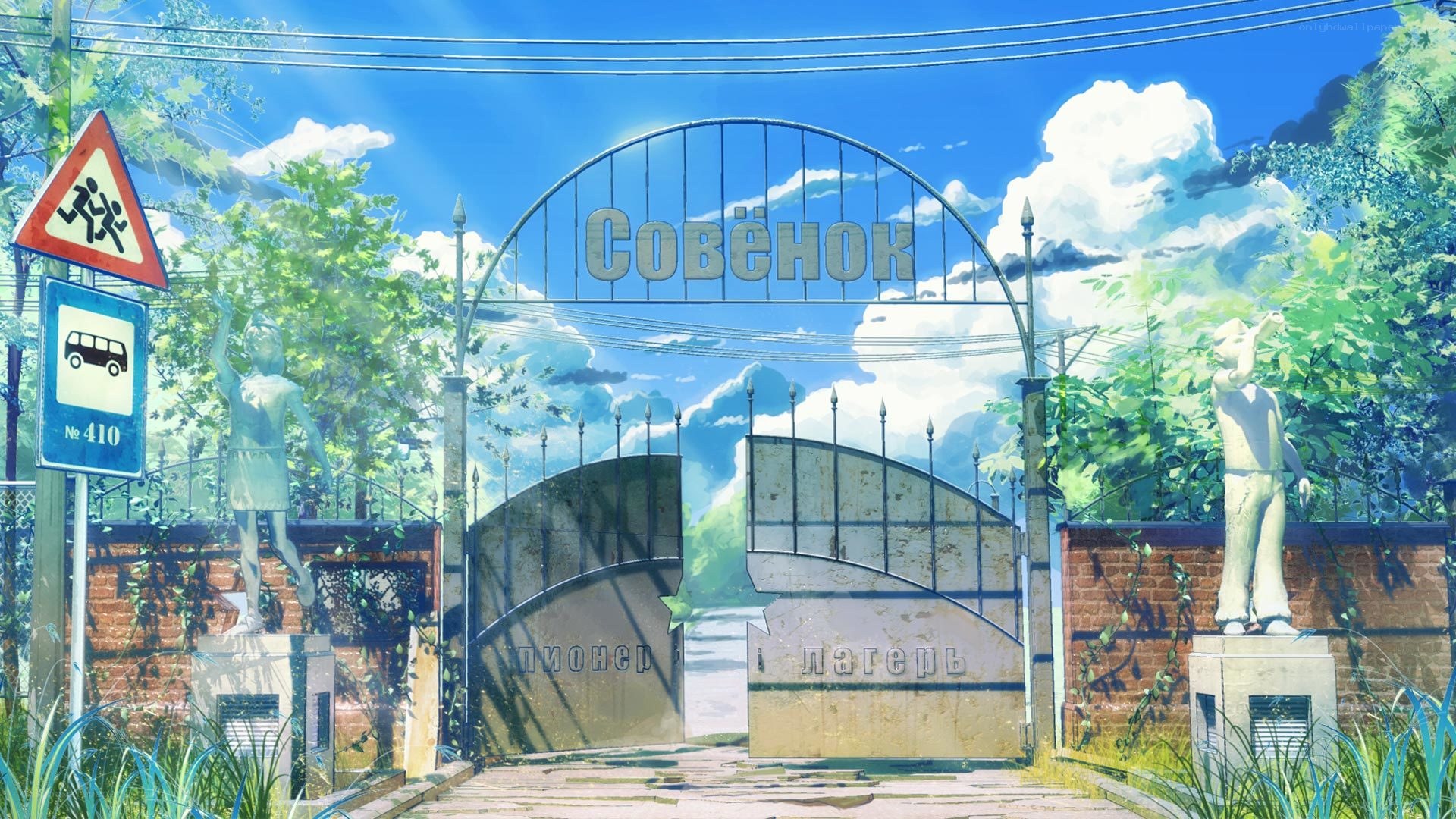 Abandoned gate with statues