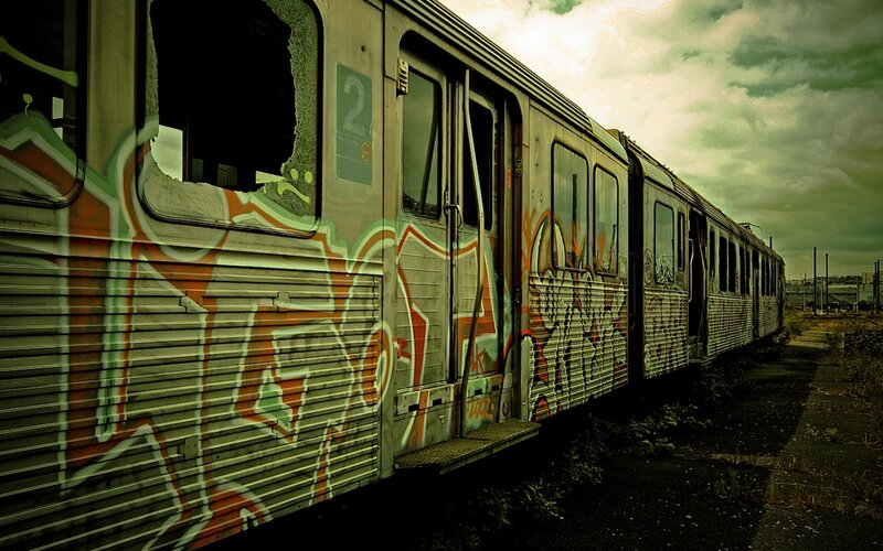 Abandoned graffiti-covered train