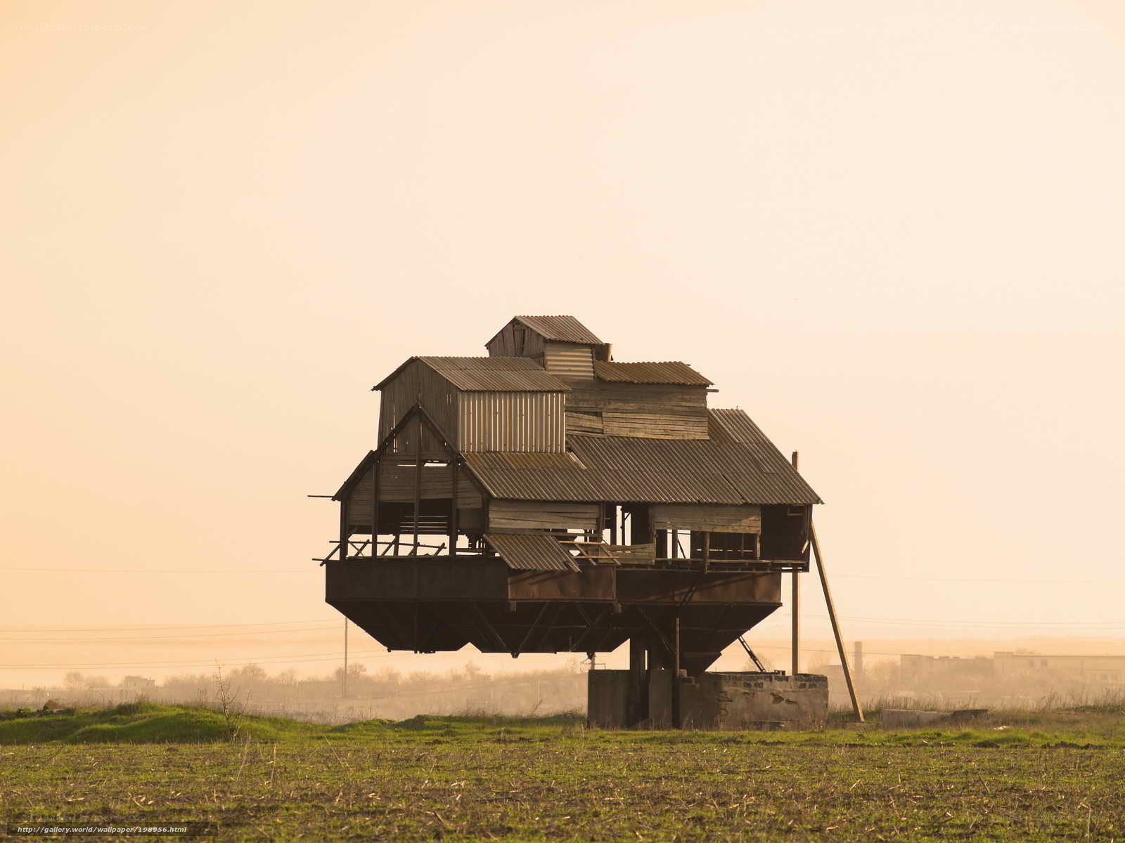 Abandoned grain silo in field