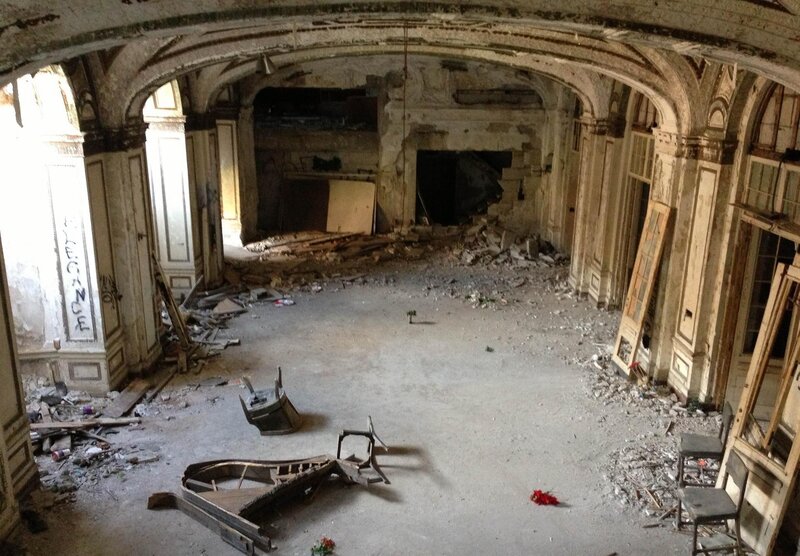 Abandoned Hall Interior — Gray, Desolate, Photograph, Debris