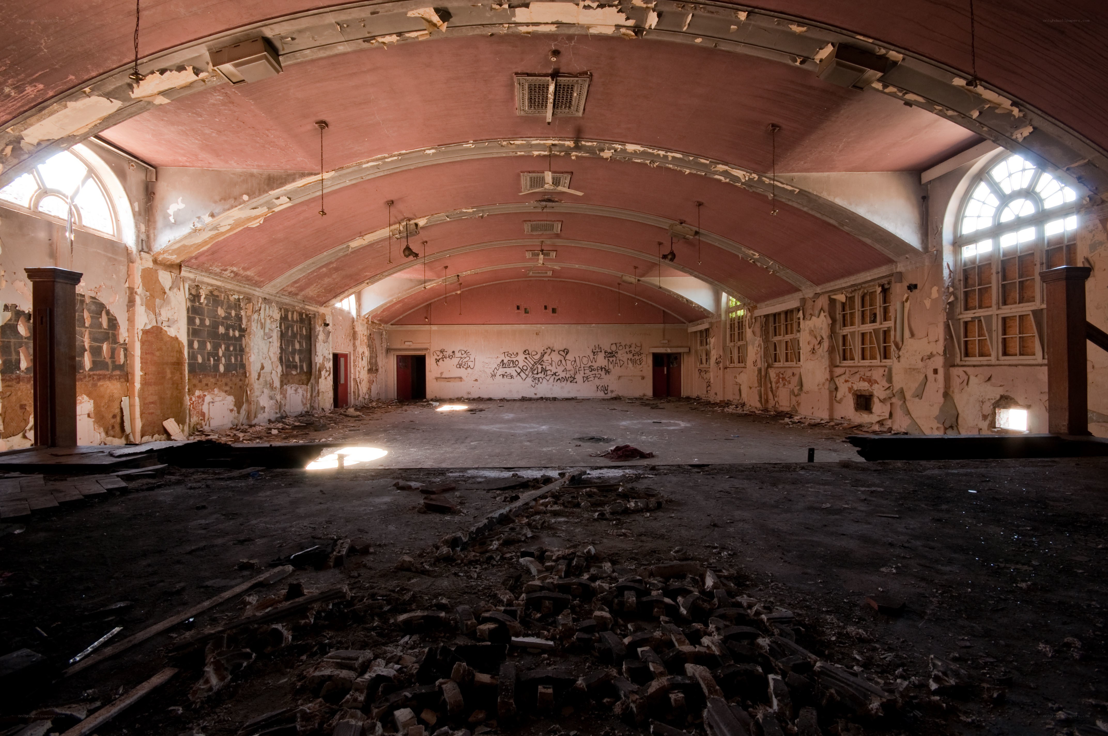 abandoned hall with graffiti