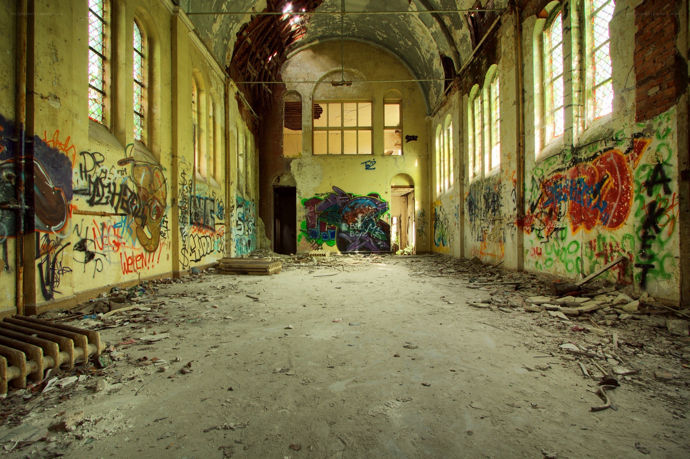 Abandoned hall with graffiti