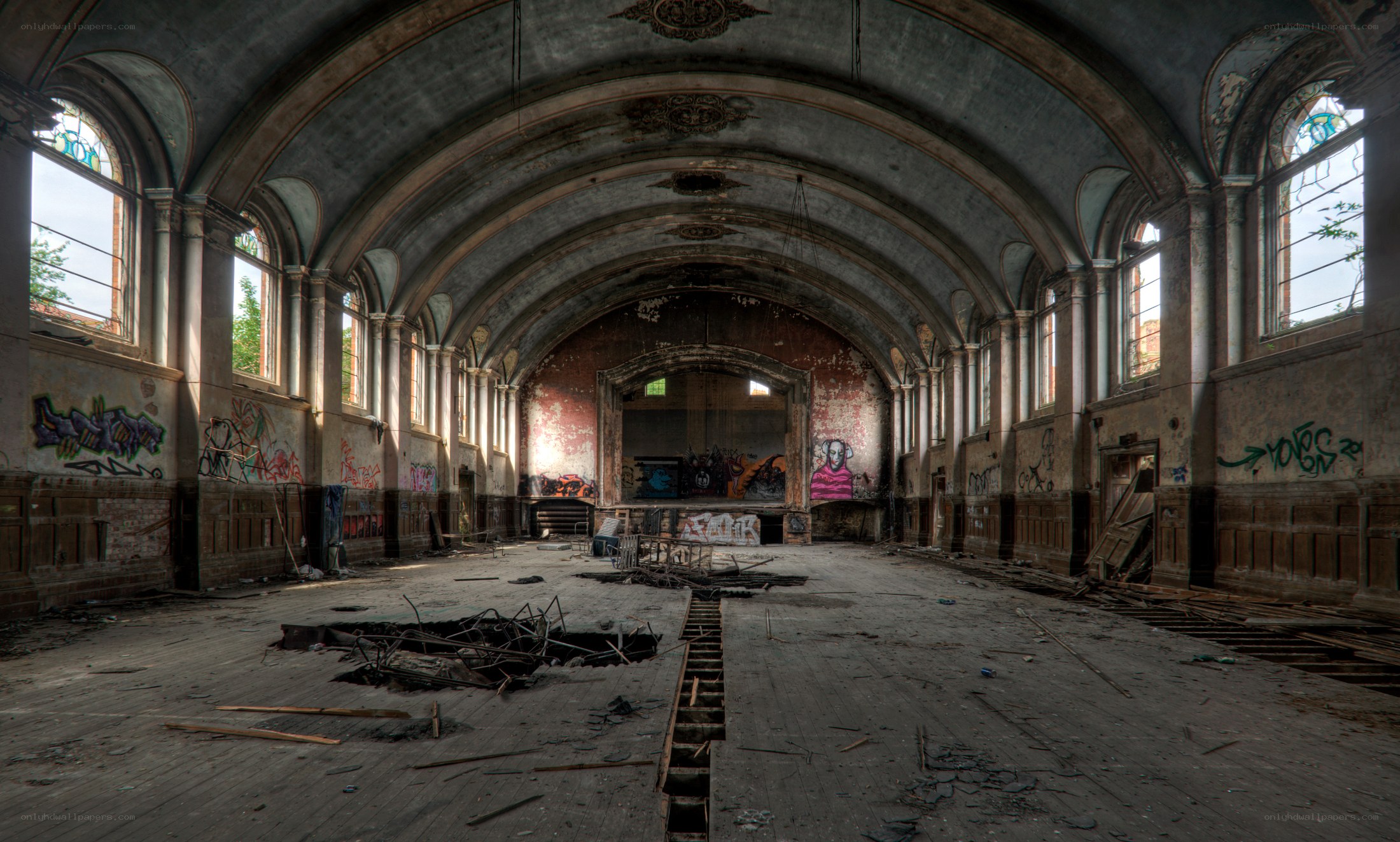 Abandoned hall with graffiti