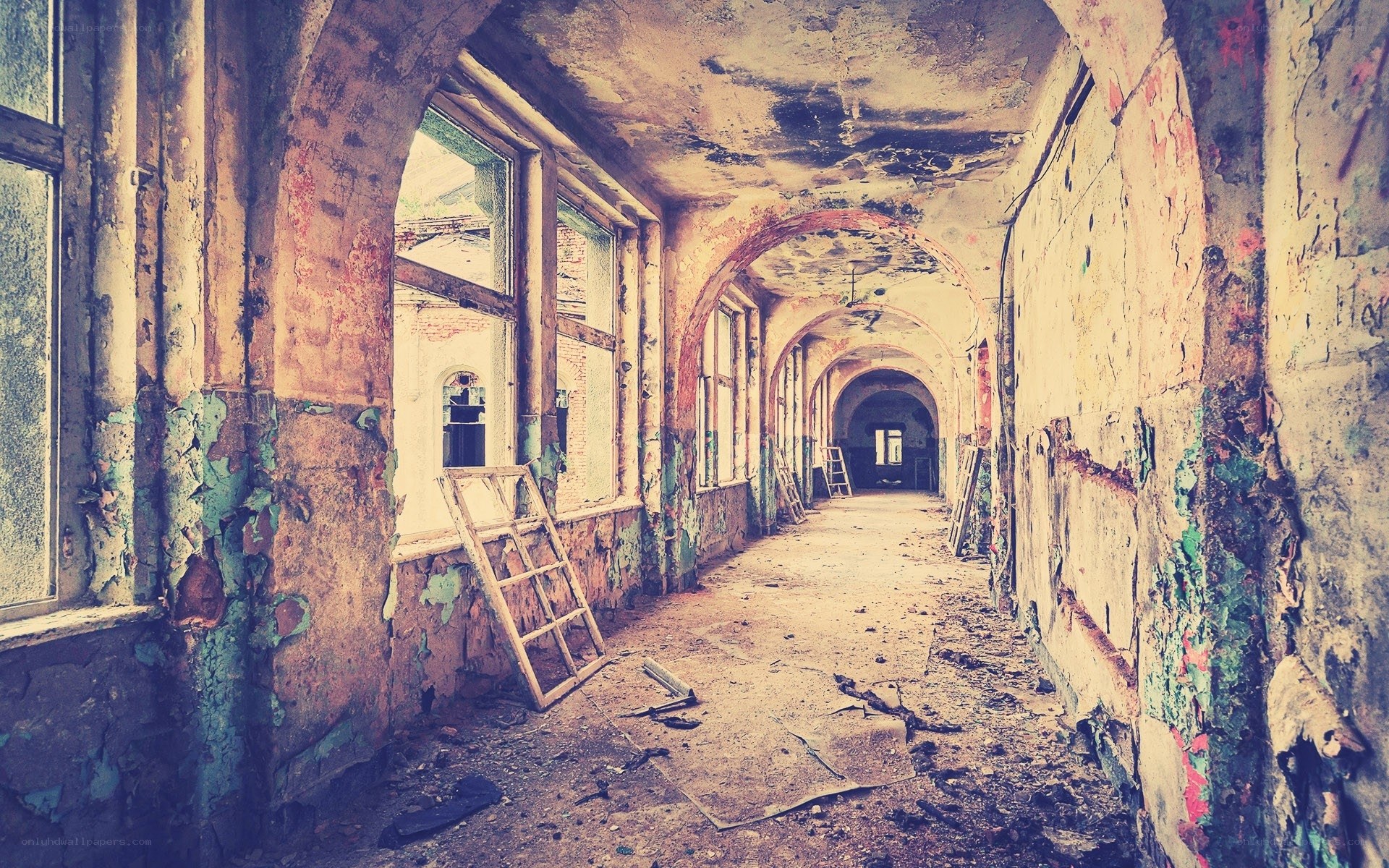abandoned hallway with arches