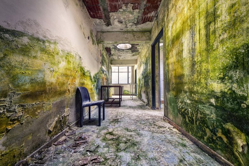 Abandoned Hallway with Chair