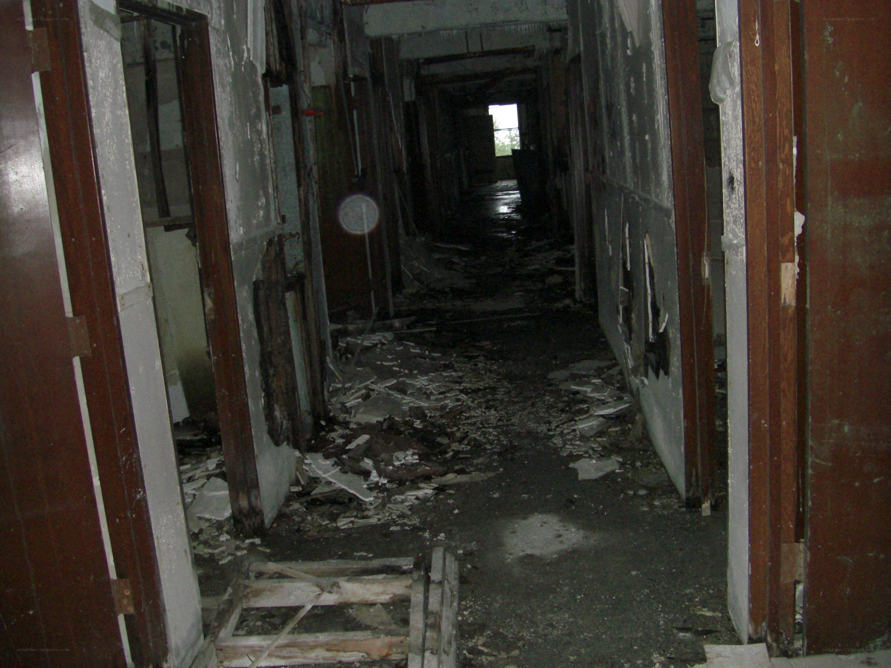abandoned hallway with debris