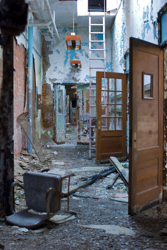 abandoned hallway with debris