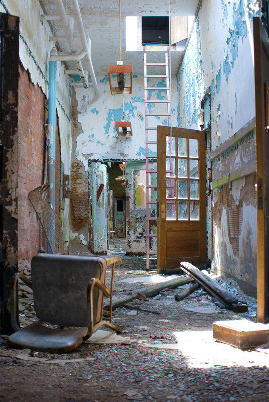 abandoned hallway with debris