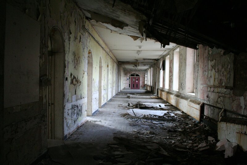 Abandoned hallway with debris