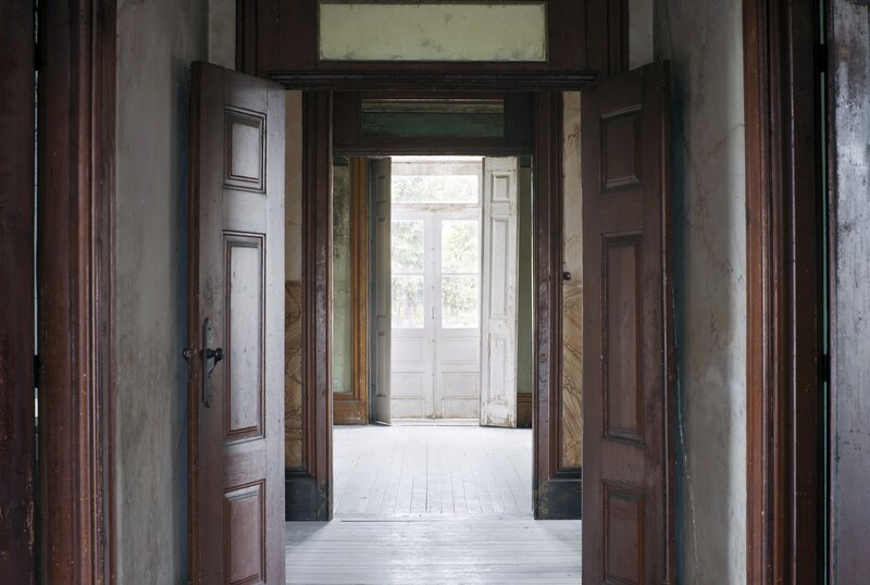 Abandoned Hallway with Doors — Brown
