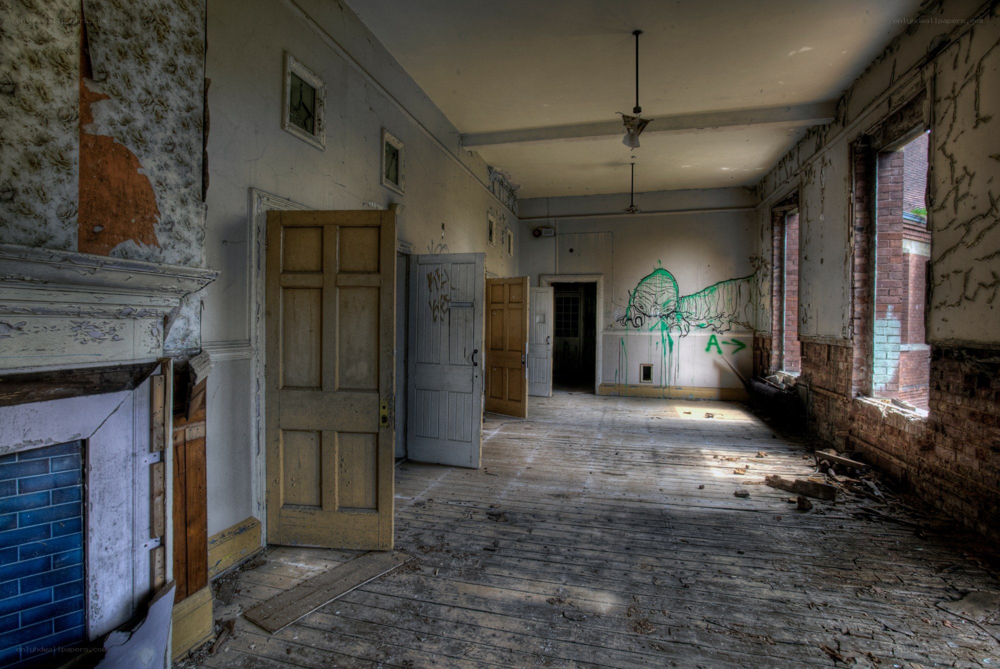 abandoned hallway with graffiti