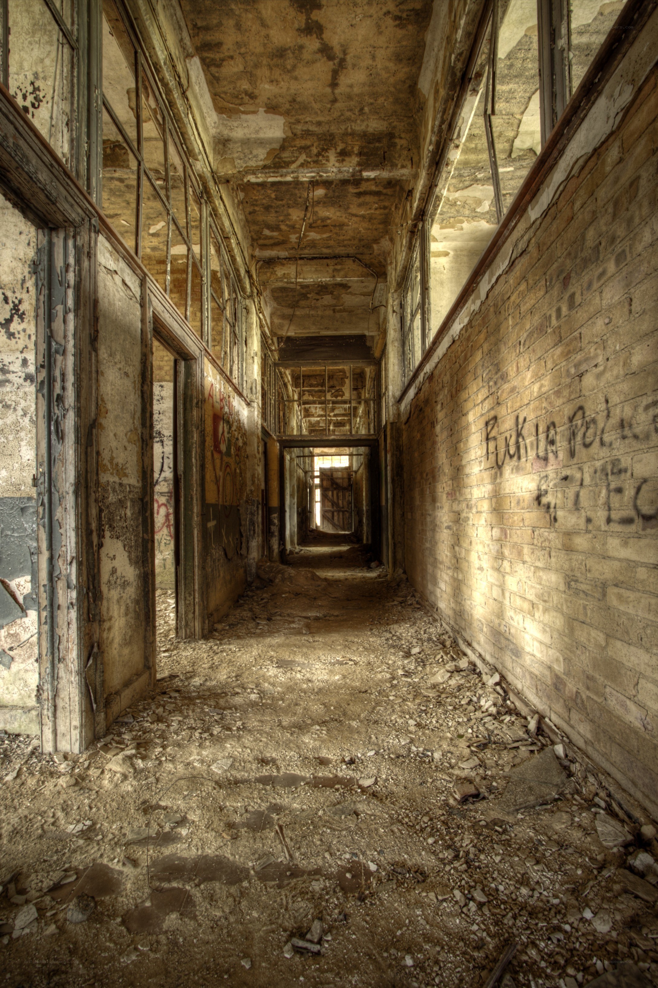 abandoned hallway with graffiti