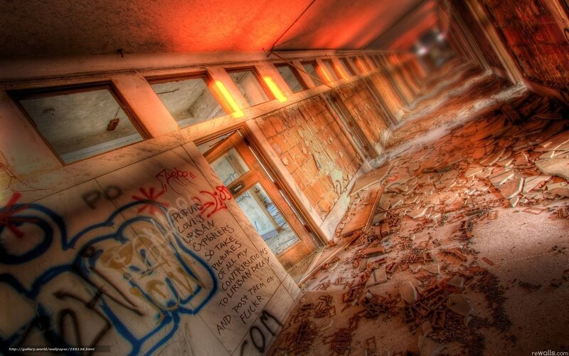 abandoned hallway with graffiti