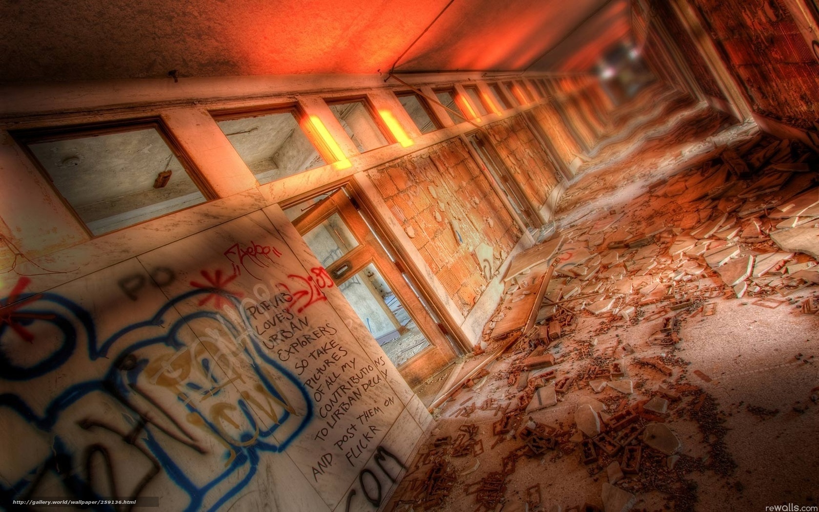 abandoned hallway with graffiti