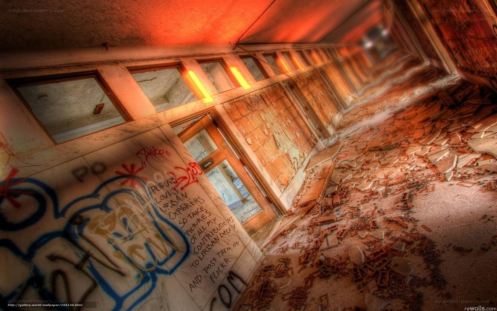 abandoned hallway with graffiti