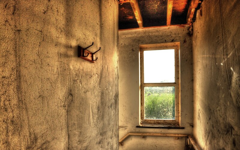 abandoned hallway with window