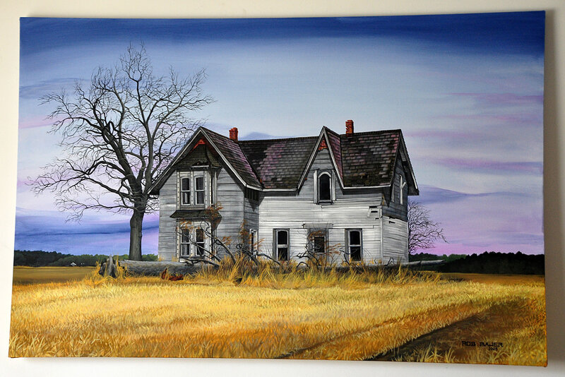 Abandoned house in a field