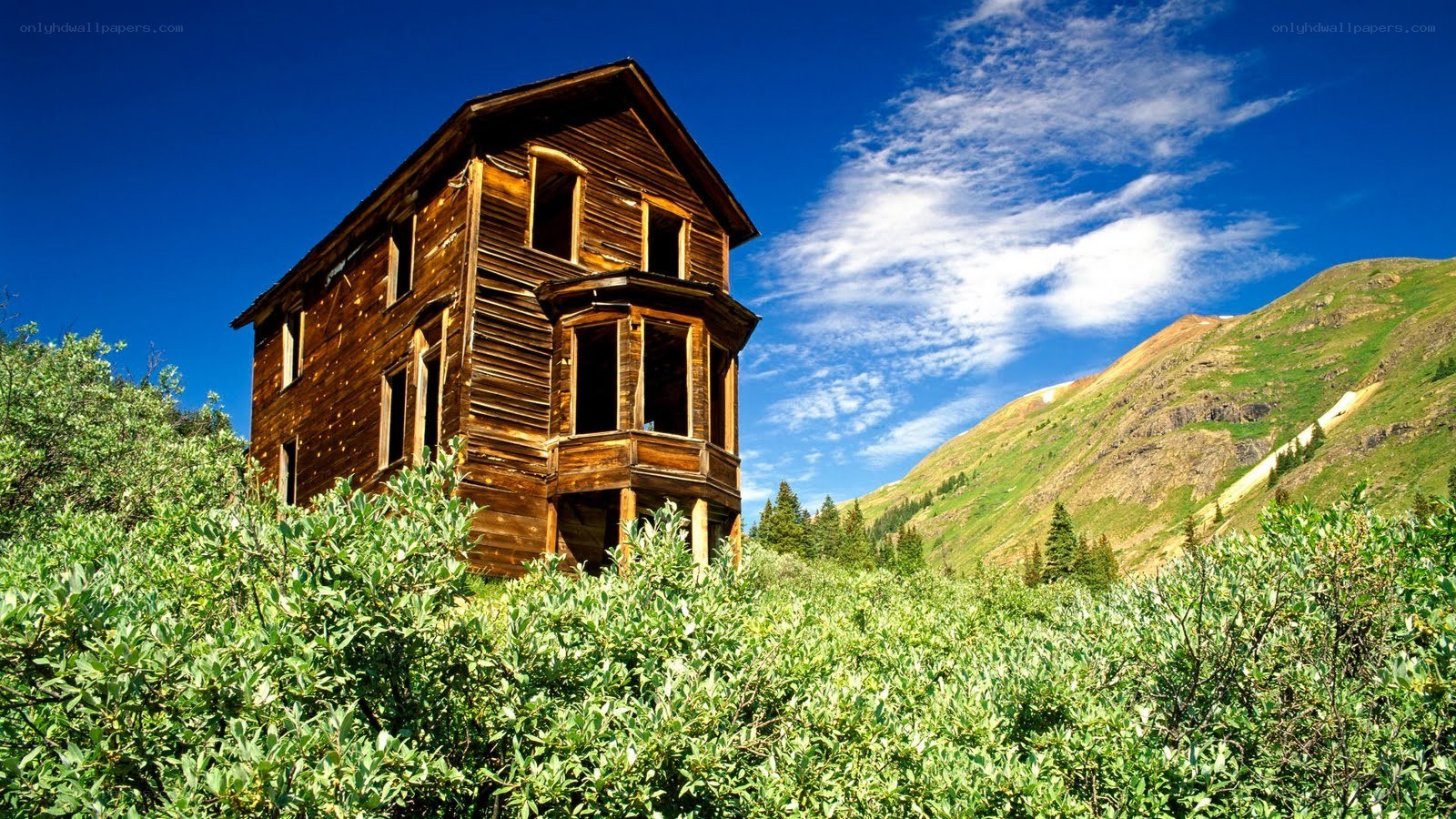 Abandoned house in mountain valley