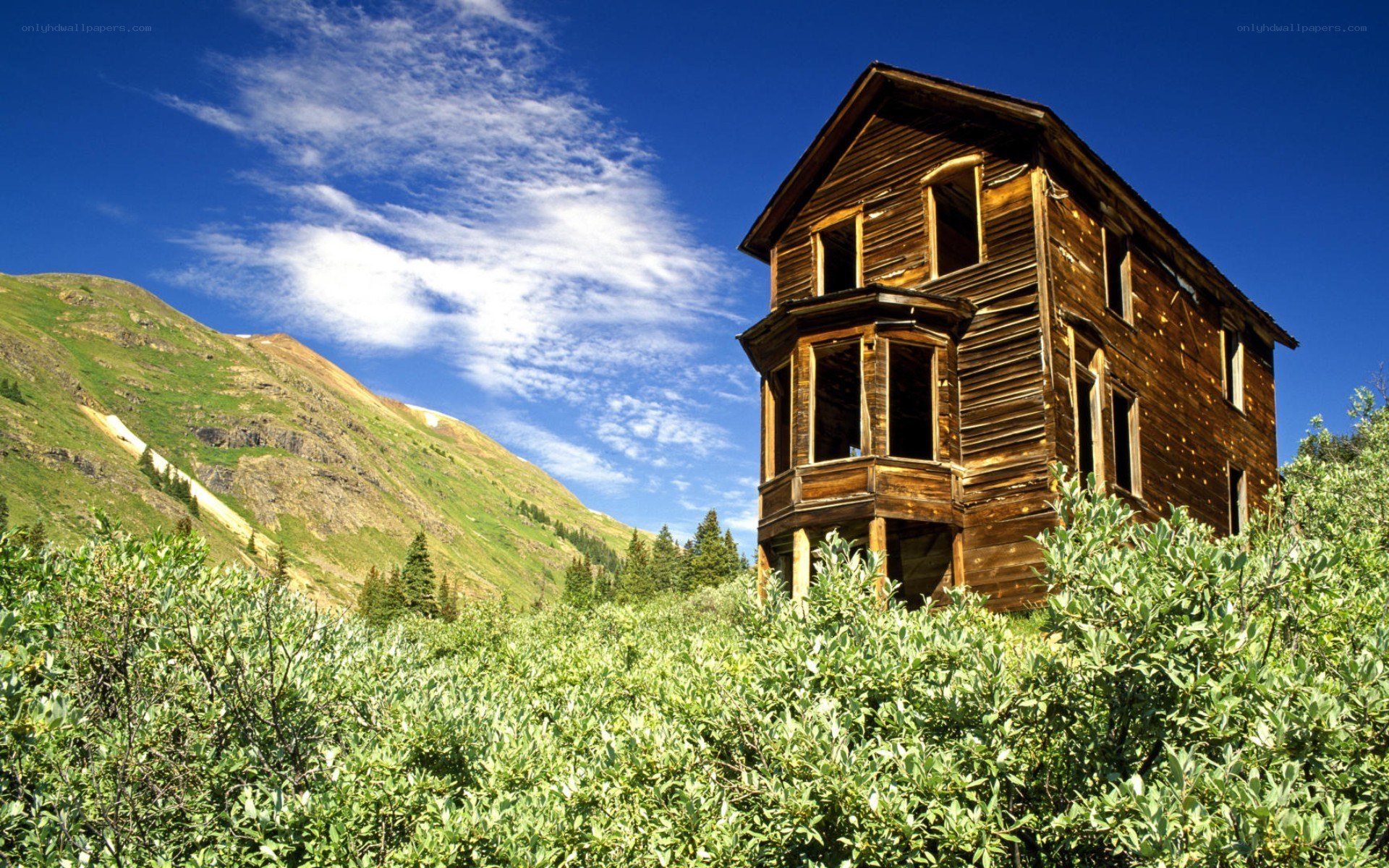 Abandoned house in mountain valley