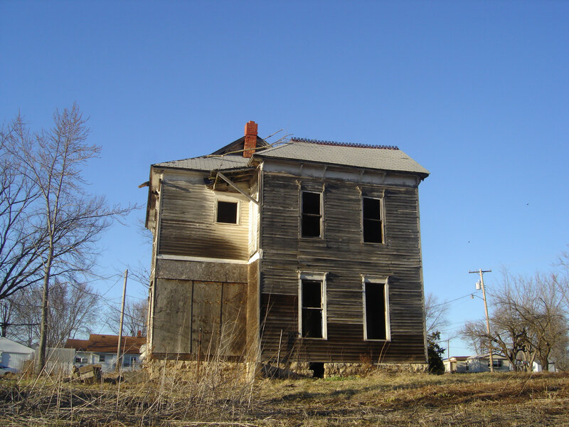 abandoned house under blue sky