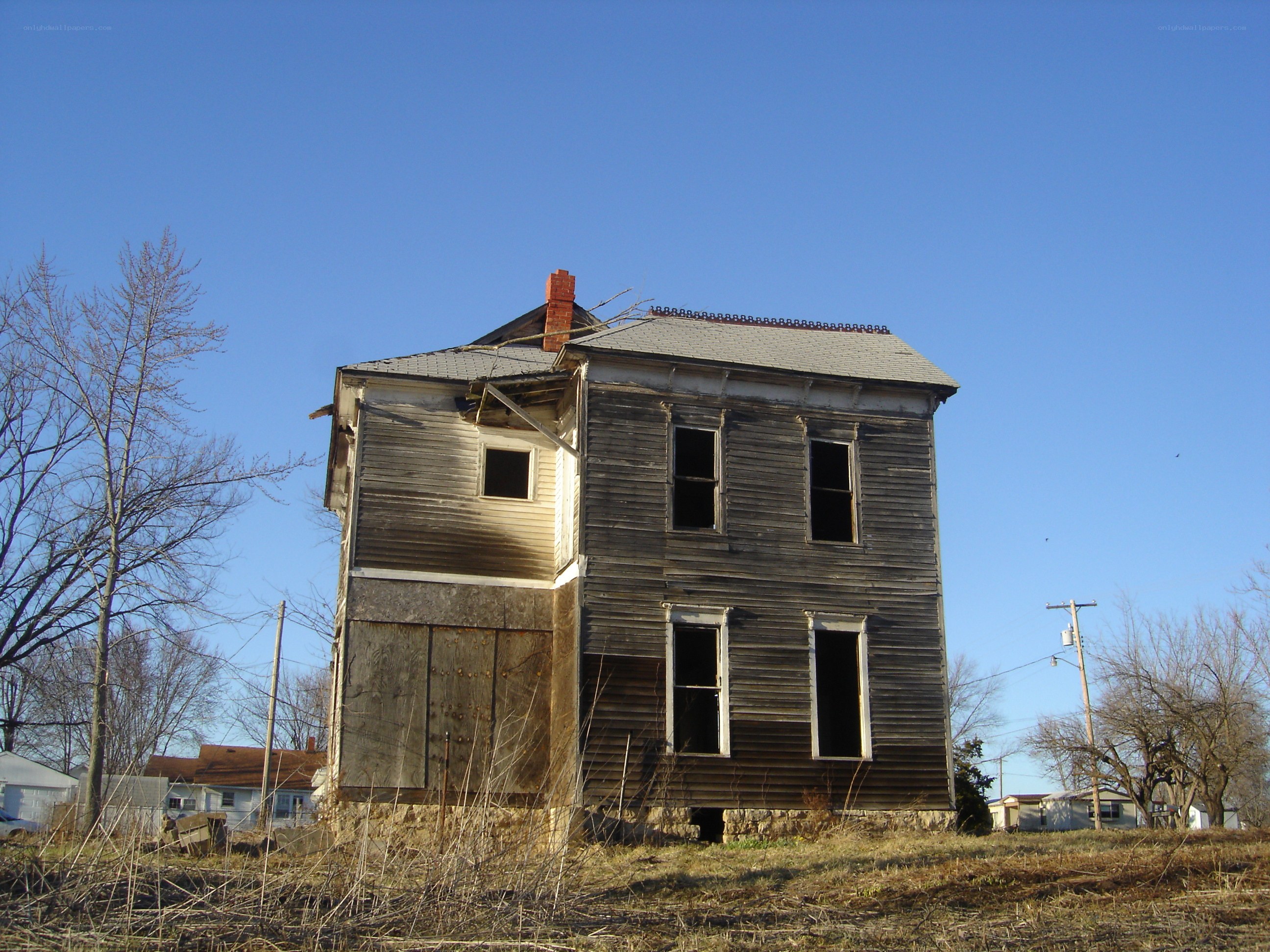 abandoned house under blue sky