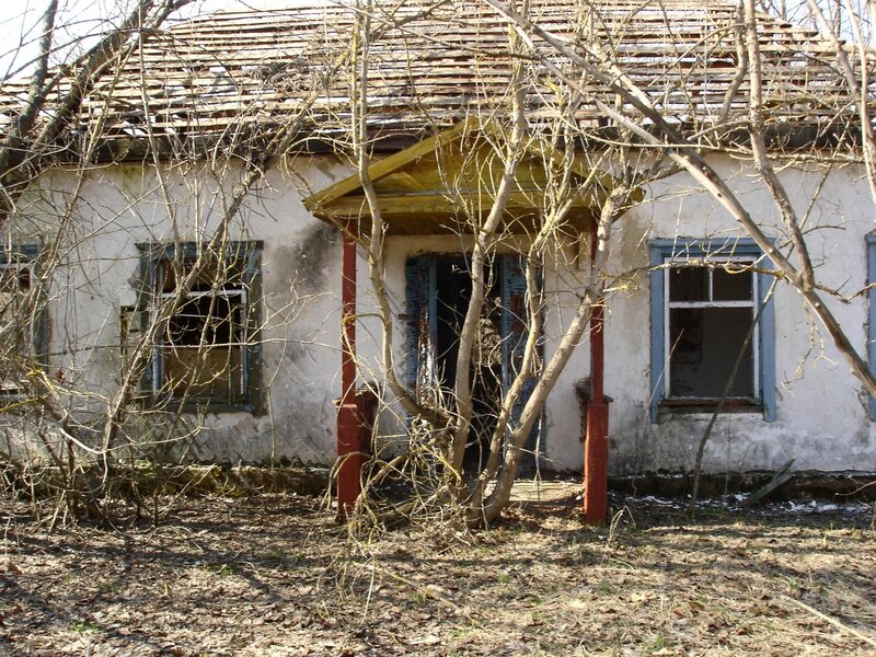 abandoned house with broken roof