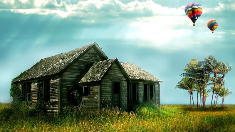 Abandoned house with hot air balloons