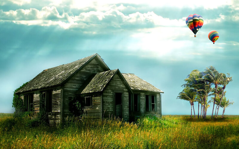 Abandoned house with hot air balloons