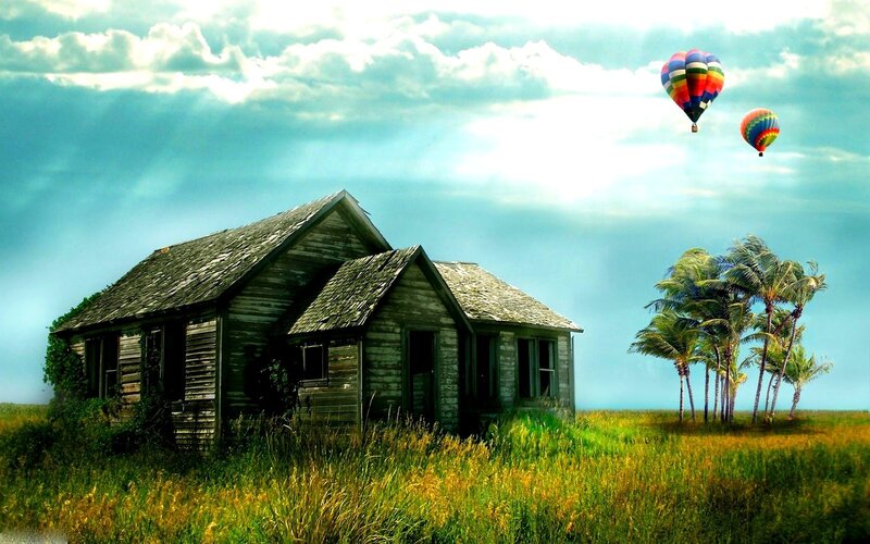 Abandoned house with hot air balloons