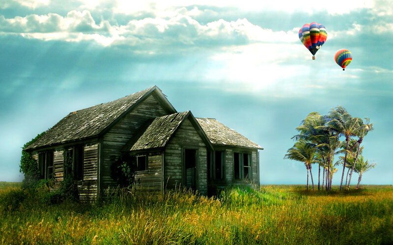 Abandoned house with hot air balloons