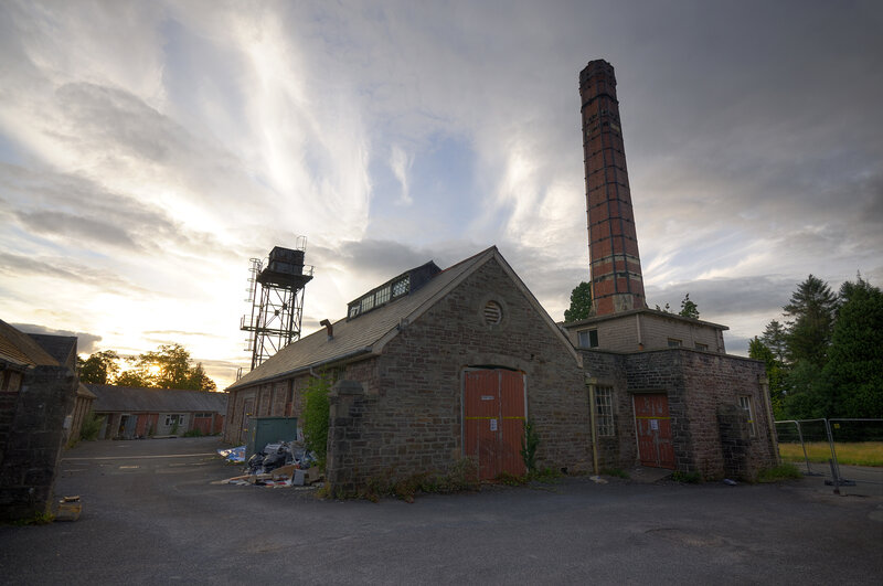 Abandoned industrial building at sunset