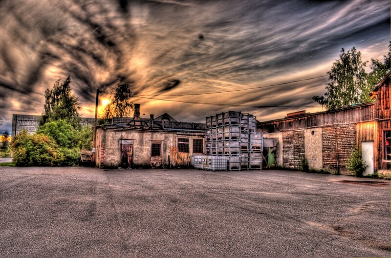 Abandoned industrial buildings at sunset