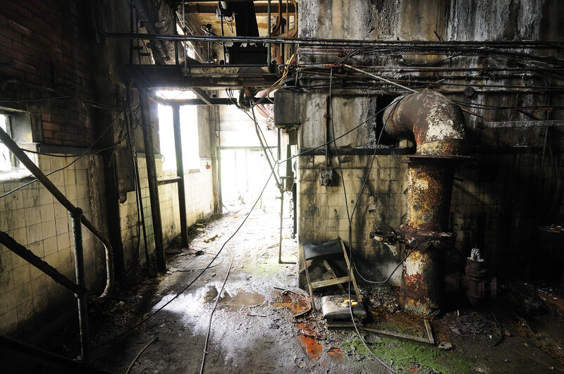 Abandoned Industrial Corridor — Gray, Dramatic