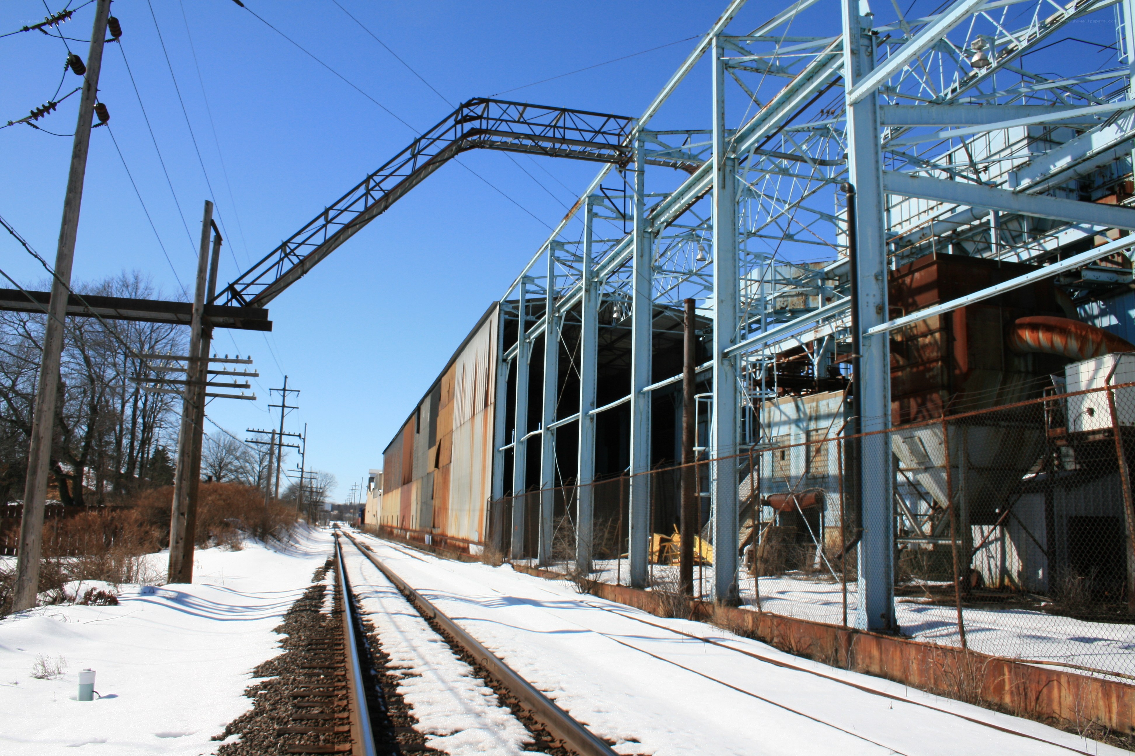 Abandoned industrial site with train tracks