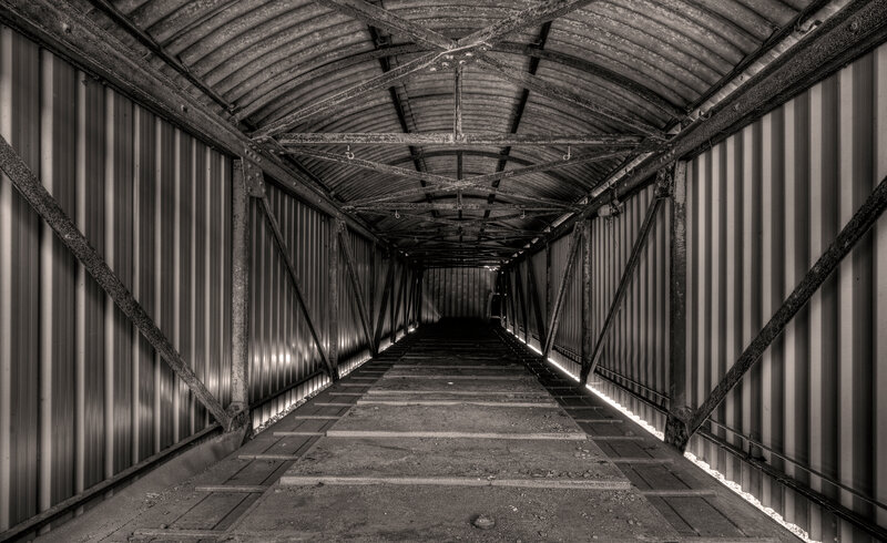 Abandoned metal tunnel corridor