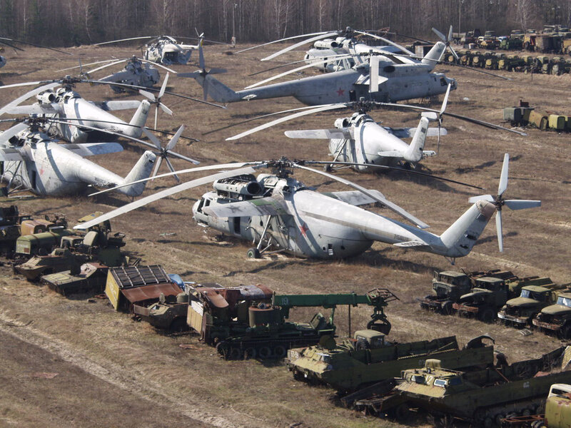 Abandoned military helicopters and vehicles