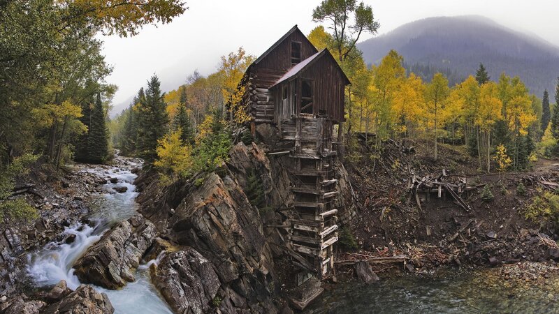 Abandoned mill by a river