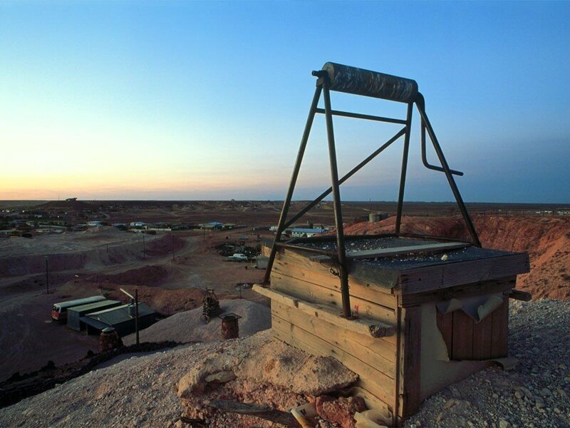 Abandoned mine equipment at sunset