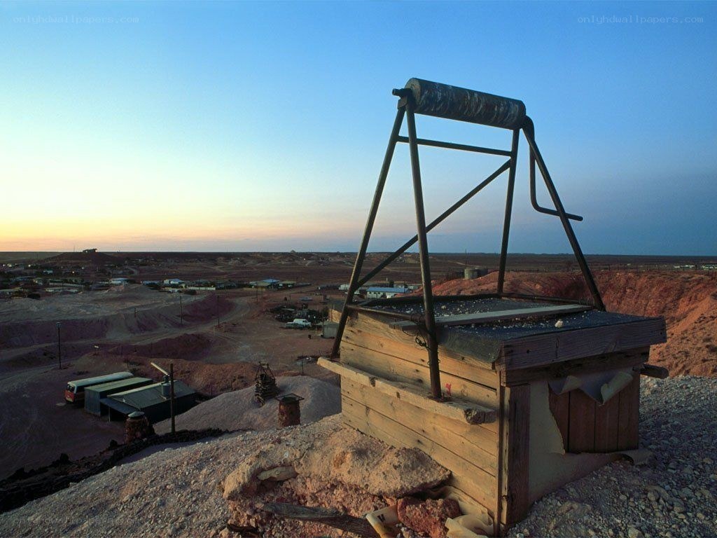 Abandoned mine equipment at sunset