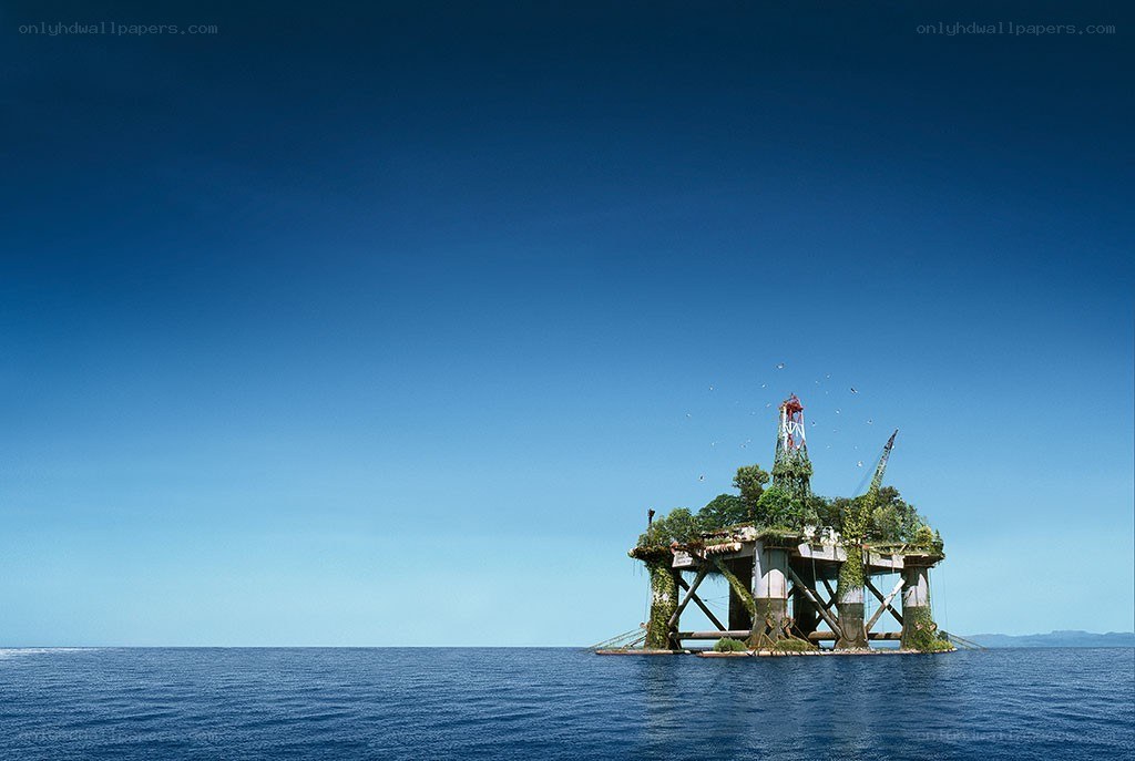 Abandoned oil rig overgrown with plants