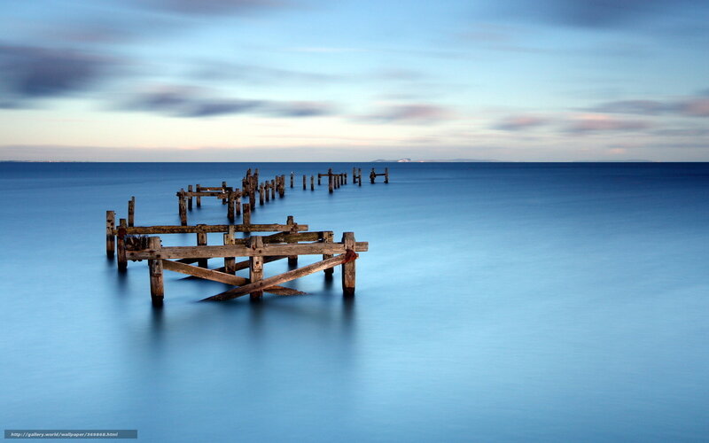 Abandoned pier at dusk