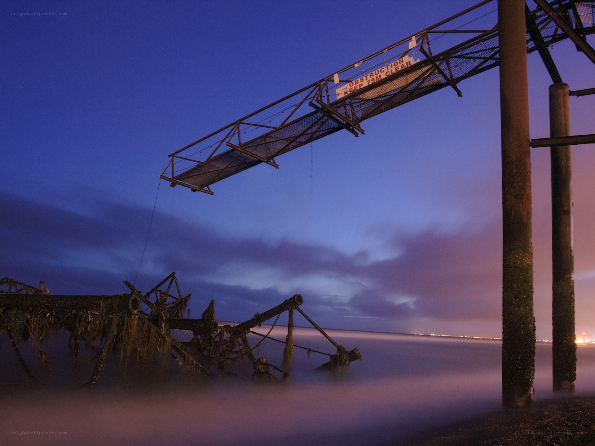 Abandoned pier at dusk