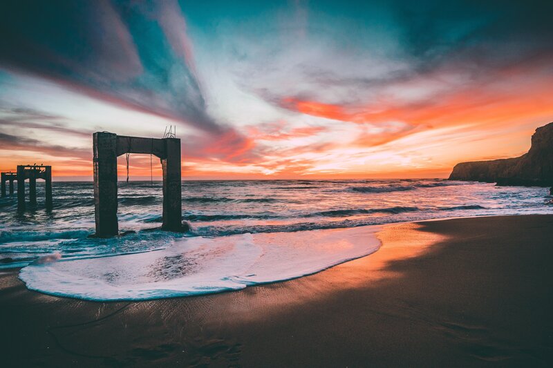 Abandoned Pier at Sunset — Orange, Dramatic, Photograph