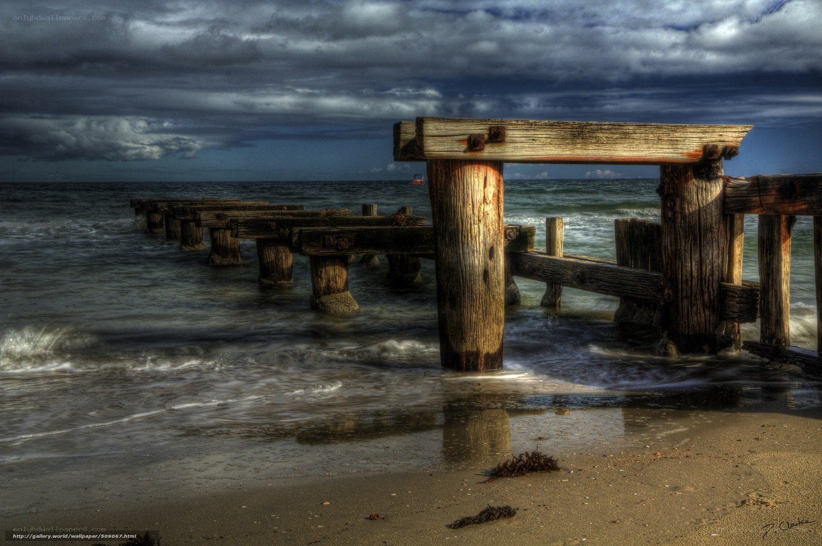 Abandoned pier at the beach