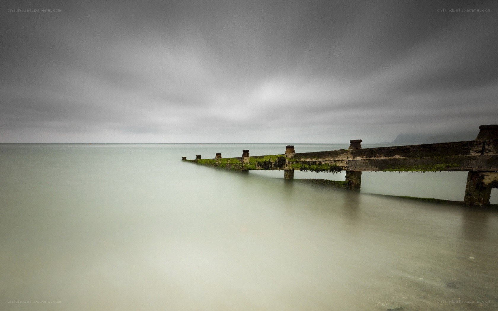 Abandoned pier on a cloudy day