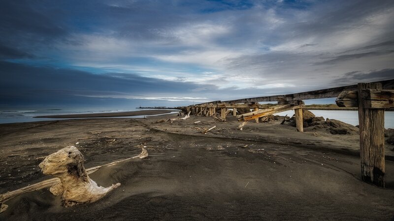 Abandoned Pier on Beach — Blue